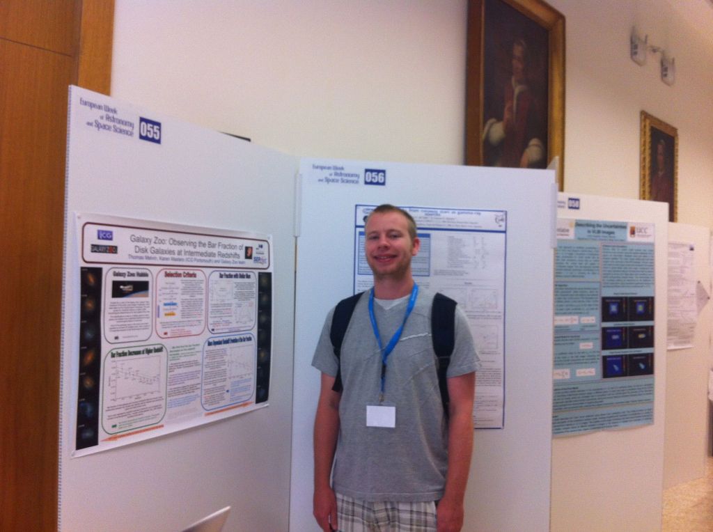 Tom Melvin with his poster at EWASS
