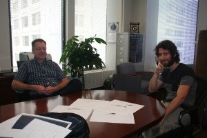 Mike Crenshaw and Justin Gagne discussing the Teacup calculations in Atlanta.